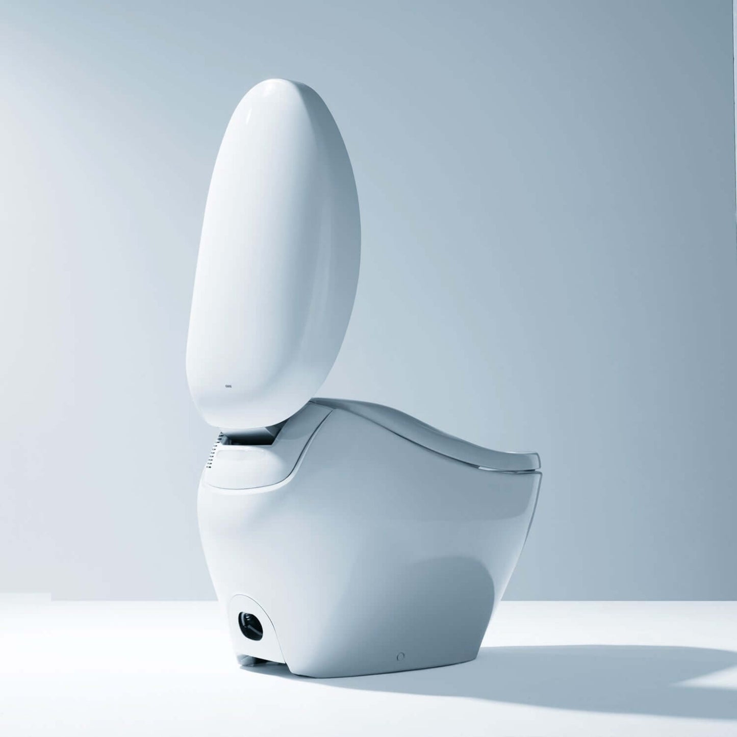 TOTO NEOREST NX1 MS902CUMFG#01 dual flush 1.0 and 0.8 GPF bidet toilet with universal height in an elliptical design